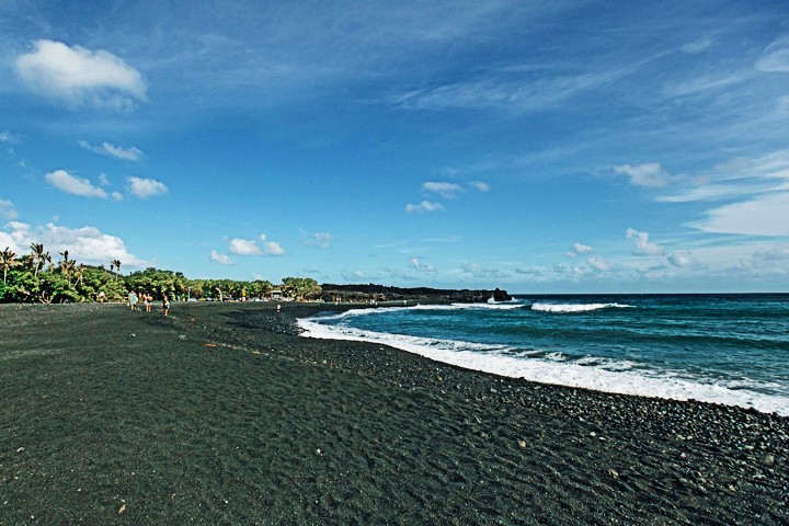 See a newly formed black sand beach